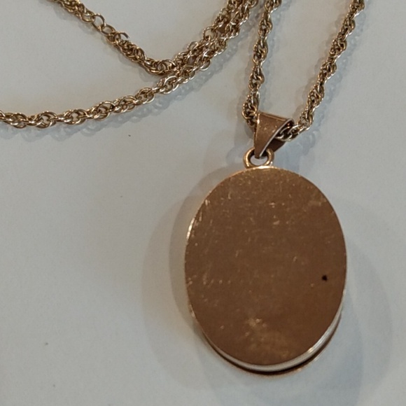 Beautiful 14 karat gold chain and lock it that opens for pictures if you choose. - Picture 6 of 6